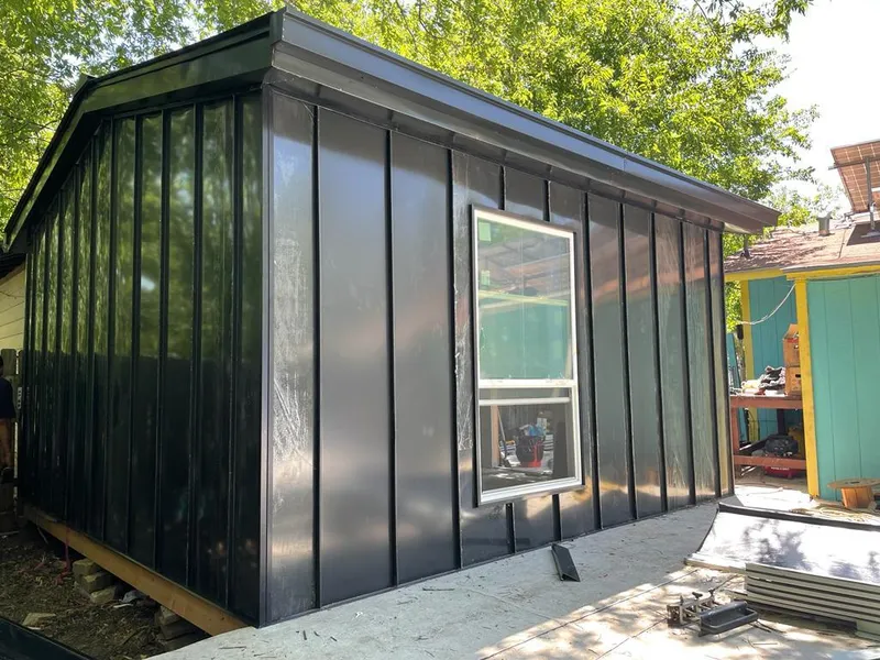 Black standing seam metal wall panels for Metal Roof Installation in Dove Valley