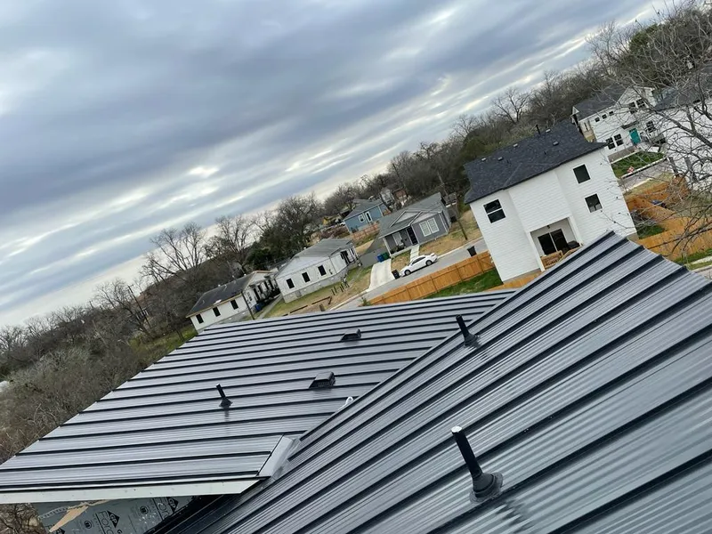 Standing seam metal roof panels with vents for Skylight Repair in Dove Valley